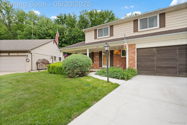 9495 Continental Dr, Taylor, MI 48180 - traditional home featuring a front lawn, brick siding, concrete driveway, covered porch, and a garage