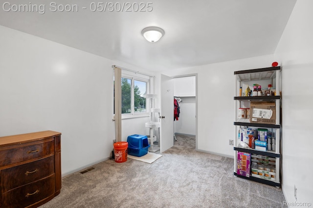 9495 Continental Dr, Taylor, MI 48180 - bedroom featuring carpet floors and a walk in closet