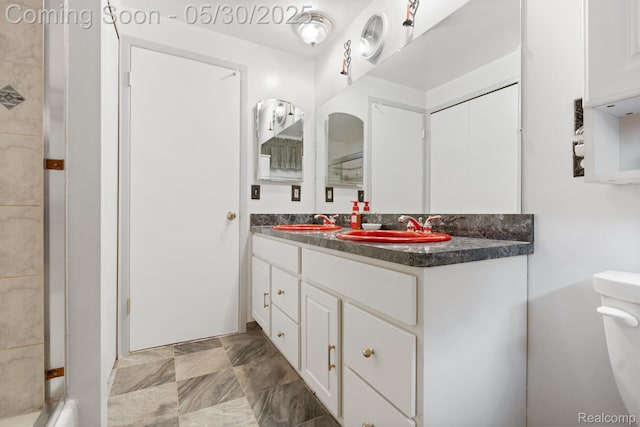9495 Continental Dr, Taylor, MI 48180 - bathroom featuring vanity, toilet, and a shower