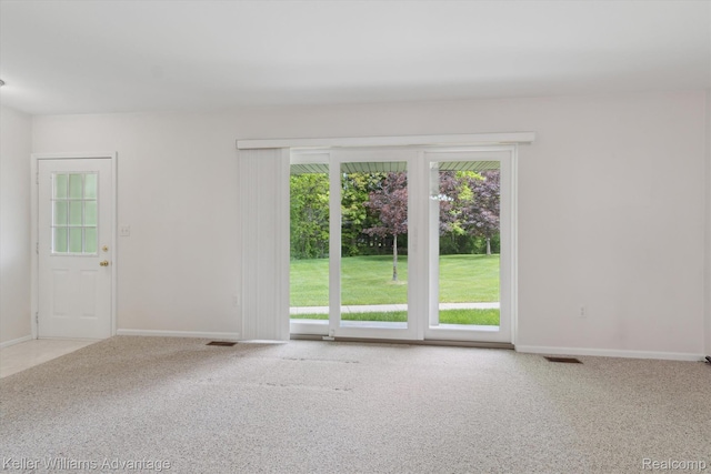 48727 Aberdeen Ct, Shelby Twp, MI 48315 - carpeted empty room with plenty of natural light and baseboards