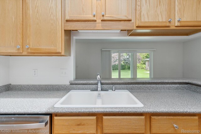 48727 Aberdeen Ct, Shelby Twp, MI 48315 - kitchen featuring stainless steel dishwasher, a sink, light countertops, and light brown cabinets