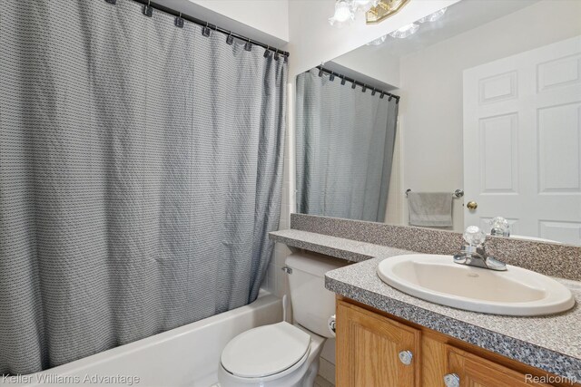 48727 Aberdeen Ct, Shelby Twp, MI 48315 - bathroom with vanity, shower / bath combo, and toilet