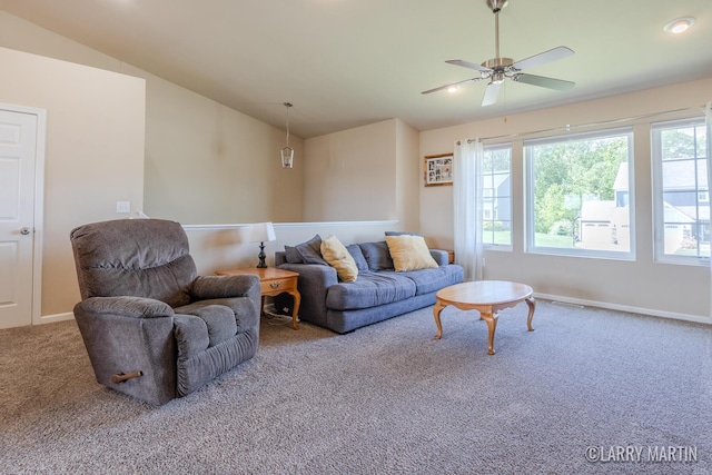 709 Wild Flower Dr, Wayland, MI 49348 - living room with lofted ceiling, carpet floors, ceiling fan, and baseboards