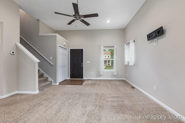 4335 Norway St, Holt, MI 48842 - entrance foyer with carpet, a ceiling fan, stairs, baseboards, and recessed lighting