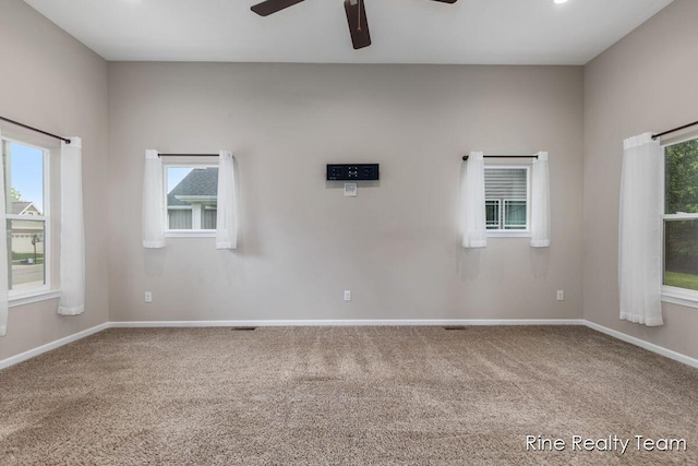 4335 Norway St, Holt, MI 48842 - spare room featuring carpet floors, a ceiling fan, and baseboards