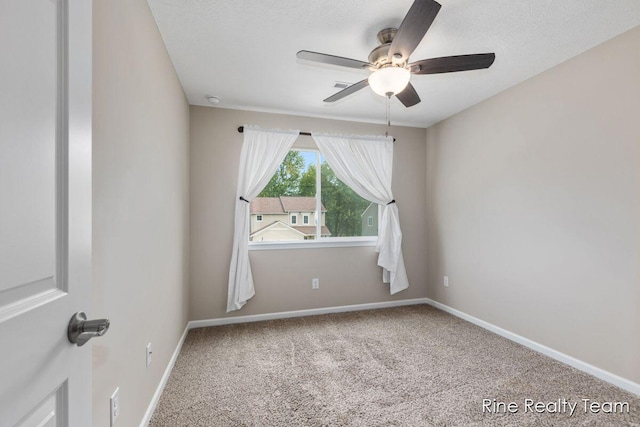 4335 Norway St, Holt, MI 48842 - spare room featuring carpet, ceiling fan, baseboards, and a smoke detector