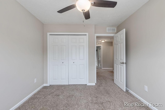 4335 Norway St, Holt, MI 48842 - unfurnished bedroom featuring carpet floors, a closet, and baseboards