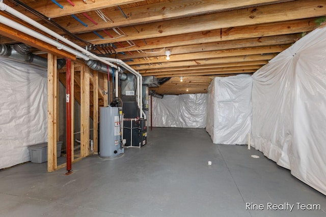 4335 Norway St, Holt, MI 48842 - unfinished basement featuring gas water heater and heating unit