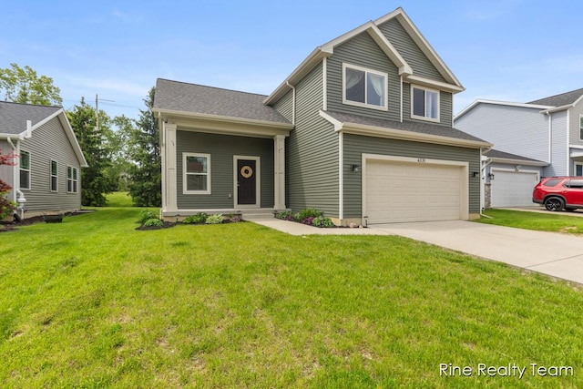 4335 Norway St, Holt, MI 48842 - view of front of property featuring an attached garage, concrete driveway, and a front yard