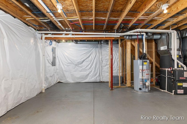 4335 Norway St, Holt, MI 48842 - unfinished below grade area featuring water heater, heating unit, and electric panel