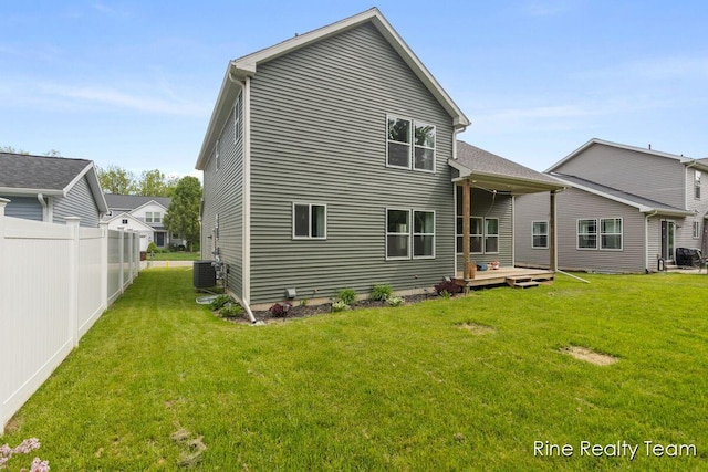 4335 Norway St, Holt, MI 48842 - rear view of property with a wooden deck