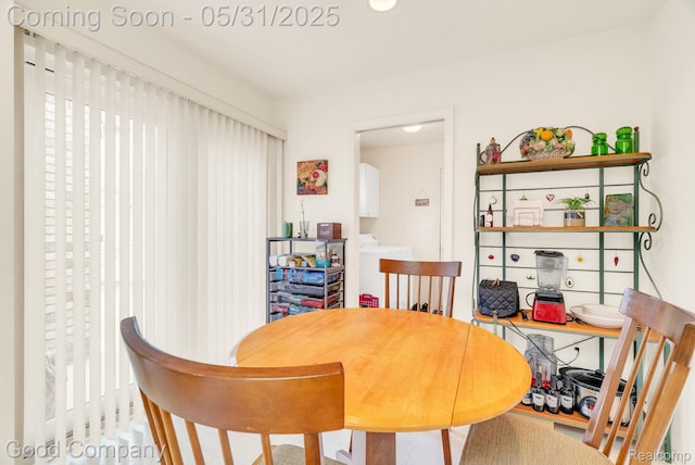 48757 Tilford Ct, Shelby Twp, MI 48315 - dining room featuring washer / clothes dryer