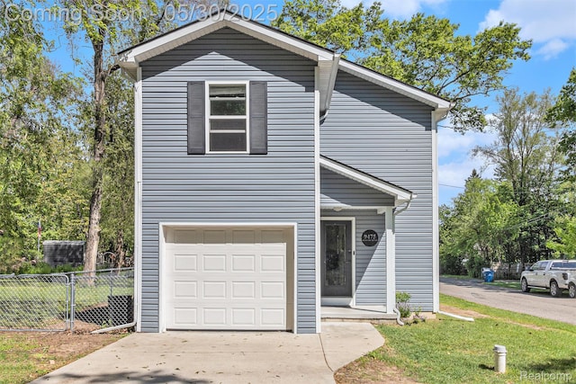 9475 Beechcrest Dr, White Lake, MI 48386 - view of front of house featuring a garage and driveway