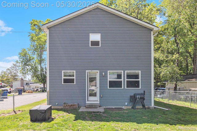 9475 Beechcrest Dr, White Lake, MI 48386 - rear view of house with entry steps