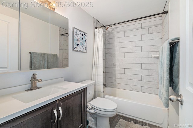 9475 Beechcrest Dr, White Lake, MI 48386 - full bath with vanity, shower / bath combo with shower curtain, toilet, and wood finished floors