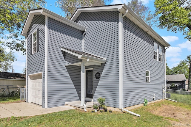9475 Beechcrest Dr, White Lake, MI 48386 - view of front of home featuring a garage and driveway