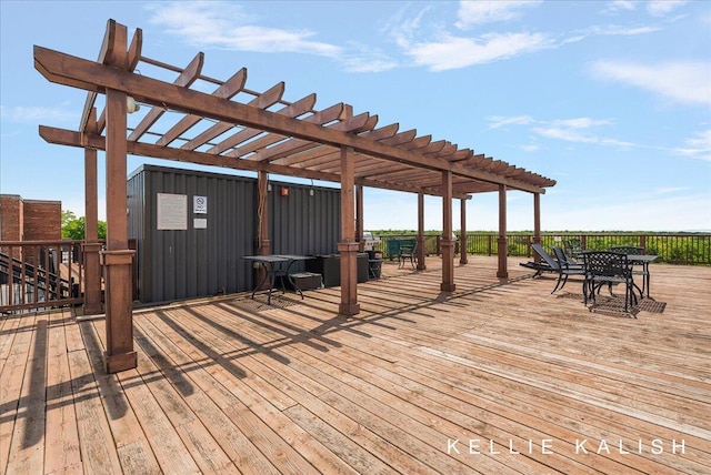 505 Cherry St SE Unit 612, Grand Rapids, MI 49503 - wooden terrace with a pergola and outdoor dining area