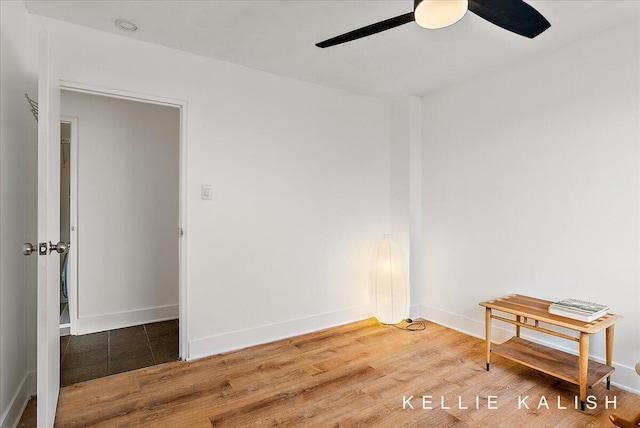 505 Cherry St SE Unit 612, Grand Rapids, MI 49503 - empty room with ceiling fan, wood finished floors, and baseboards