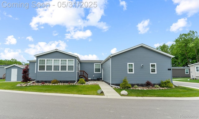 8551 Boyer Dr, Willis, MI 48191 - view of front of home featuring a front yard