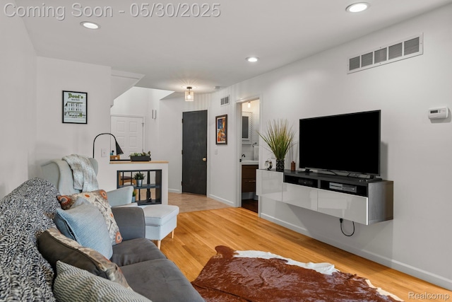 50820 Marsha Ln, New Baltimore, MI 48047 - living room featuring recessed lighting, light wood-style floors, and baseboards
