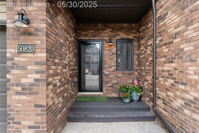 50820 Marsha Ln, New Baltimore, MI 48047 - property entrance featuring brick siding
