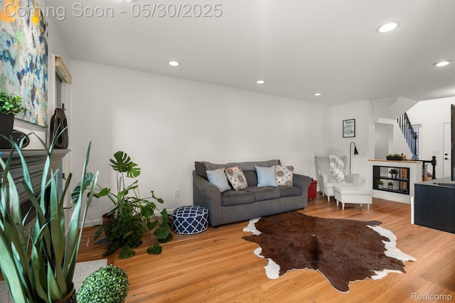 50820 Marsha Ln, New Baltimore, MI 48047 - living area featuring stairway, wood finished floors, and recessed lighting