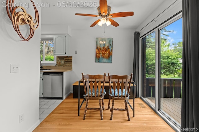 50820 Marsha Ln, New Baltimore, MI 48047 - dining room with a ceiling fan and light wood finished floors