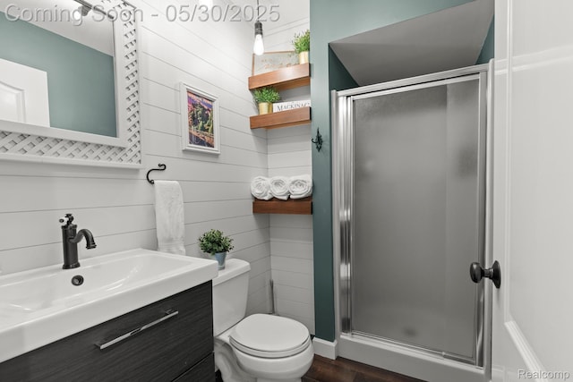 50820 Marsha Ln, New Baltimore, MI 48047 - full bathroom featuring toilet, a stall shower, vanity, wood finished floors, and wooden walls