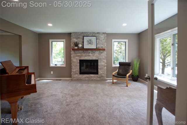 44500 Louvert Ct, Novi, MI 48375 - living area featuring healthy amount of natural light, carpet flooring, baseboards, and recessed lighting
