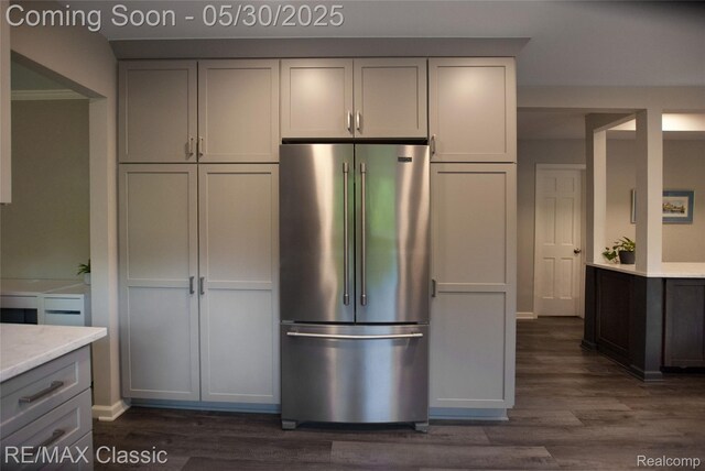 44500 Louvert Ct, Novi, MI 48375 - kitchen with high quality fridge, dark wood-style flooring, gray cabinetry, and baseboards
