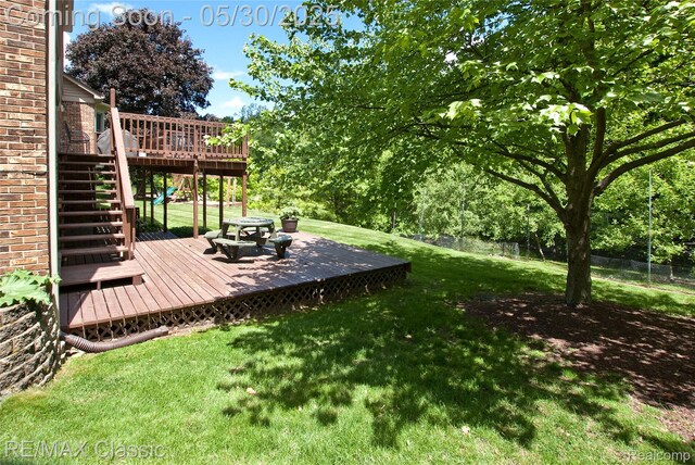 44500 Louvert Ct, Novi, MI 48375 - view of yard with a wooden deck and stairway