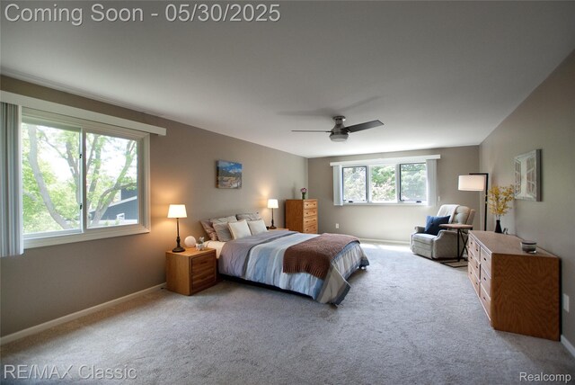 44500 Louvert Ct, Novi, MI 48375 - bedroom featuring carpet flooring, baseboards, and a ceiling fan