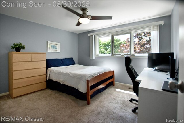 44500 Louvert Ct, Novi, MI 48375 - bedroom with carpet flooring, an office area, baseboards, and ceiling fan