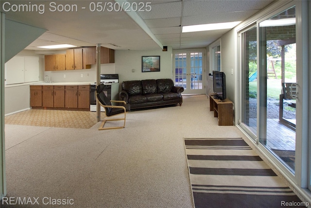 44500 Louvert Ct, Novi, MI 48375 - living room featuring light carpet, a paneled ceiling, french doors, and baseboards