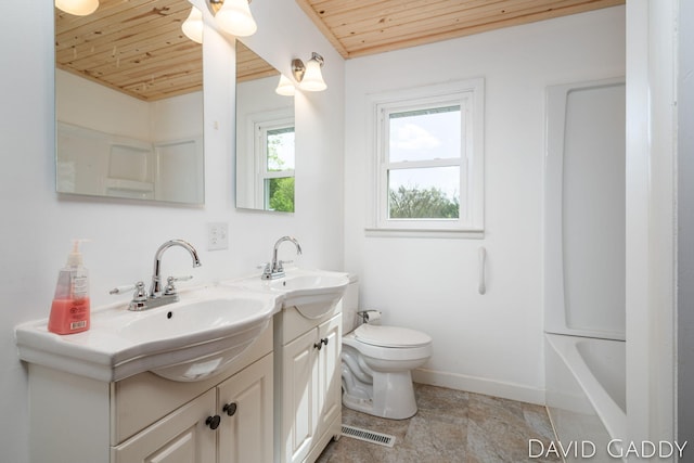 9081 E Baker Rd, Hesperia, MI 49421 - full bath with wooden ceiling, double vanity, baseboards, and toilet