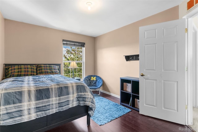 6241 Sapphire Ct, Grand Blanc, MI 48439 - bedroom featuring wood finished floors and baseboards