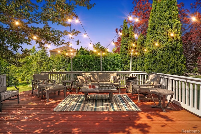 6241 Sapphire Ct, Grand Blanc, MI 48439 - deck at dusk featuring an outdoor hangout area