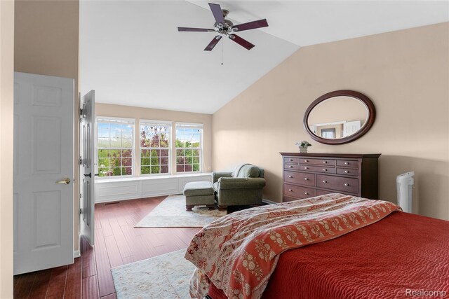 6241 Sapphire Ct, Grand Blanc, MI 48439 - bedroom with dark wood-type flooring, vaulted ceiling, and a ceiling fan