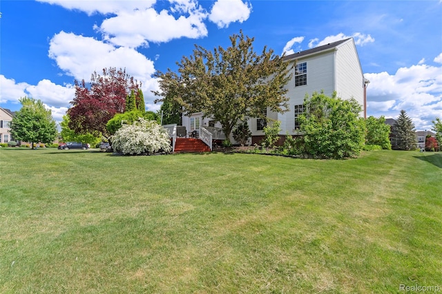 6241 Sapphire Ct, Grand Blanc, MI 48439 - view of grassy yard featuring a deck