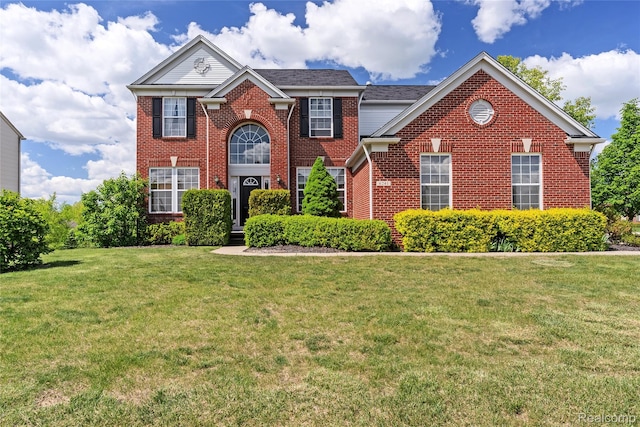 6241 Sapphire Ct, Grand Blanc, MI 48439 - view of front facade with brick siding and a front lawn