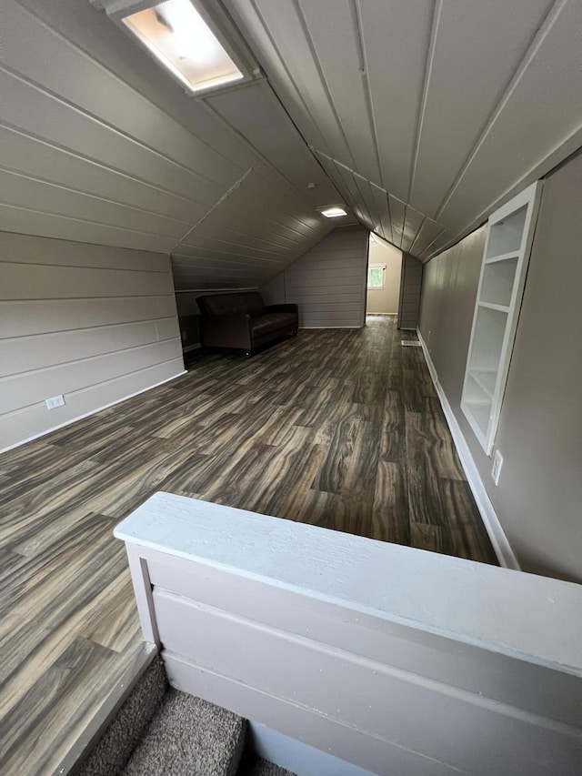 937 S Holmes St, Lansing, MI 48912 - additional living space featuring wood walls, lofted ceiling, and wood finished floors