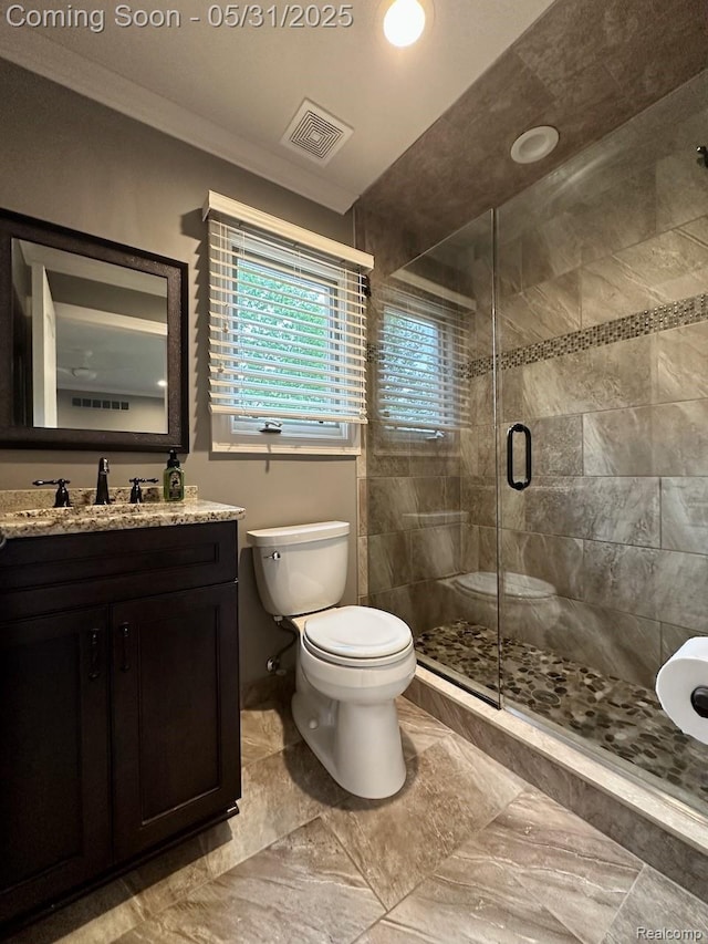 52006 Finch Ct, Shelby Twp, MI 48315 - bathroom with toilet, vanity, a shower stall, crown molding, and marble finish floors