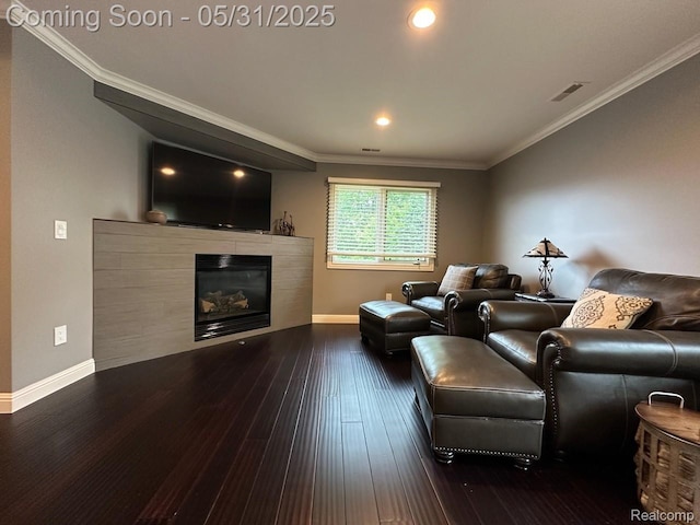 52006 Finch Ct, Shelby Twp, MI 48315 - living area with a tile fireplace, baseboards, hardwood / wood-style floors, ornamental molding, and recessed lighting