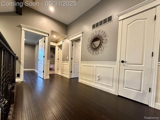 52006 Finch Ct, Shelby Twp, MI 48315 - corridor featuring dark wood-style floors, a wainscoted wall, a decorative wall, recessed lighting, and baseboards