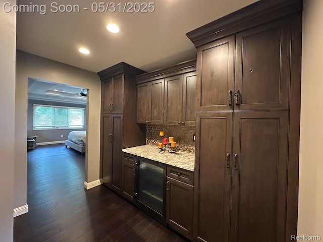 52006 Finch Ct, Shelby Twp, MI 48315 - bar area featuring baseboards, dark wood-style flooring, recessed lighting, tasteful backsplash, and wine cooler