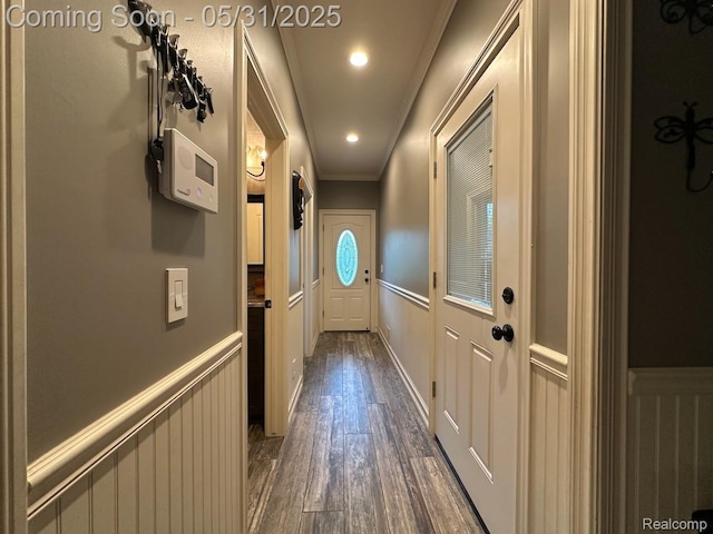 52006 Finch Ct, Shelby Twp, MI 48315 - doorway to outside featuring crown molding, a wainscoted wall, and dark wood-type flooring