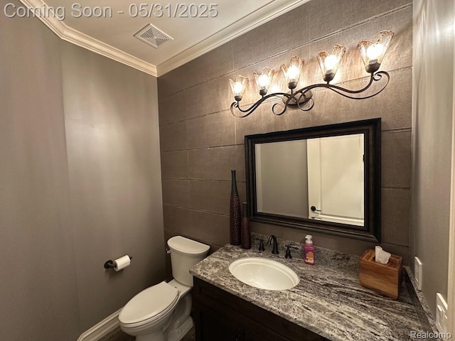 52006 Finch Ct, Shelby Twp, MI 48315 - half bath with ornamental molding, vanity, toilet, and baseboards
