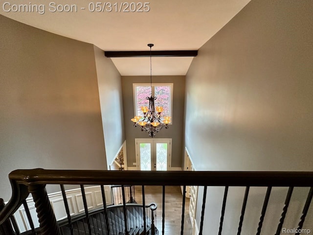 52006 Finch Ct, Shelby Twp, MI 48315 - staircase featuring a chandelier, a high ceiling, and french doors