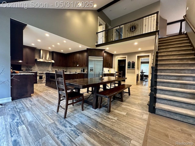 52006 Finch Ct, Shelby Twp, MI 48315 - dining area with stairway, light wood-type flooring, high vaulted ceiling, beamed ceiling, and recessed lighting