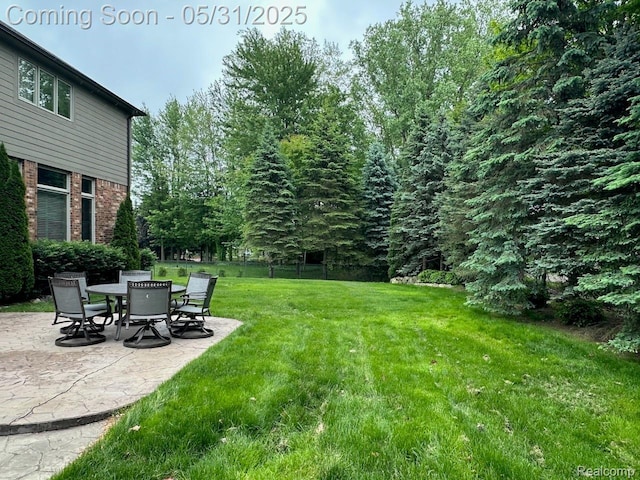52006 Finch Ct, Shelby Twp, MI 48315 - view of green lawn featuring a patio